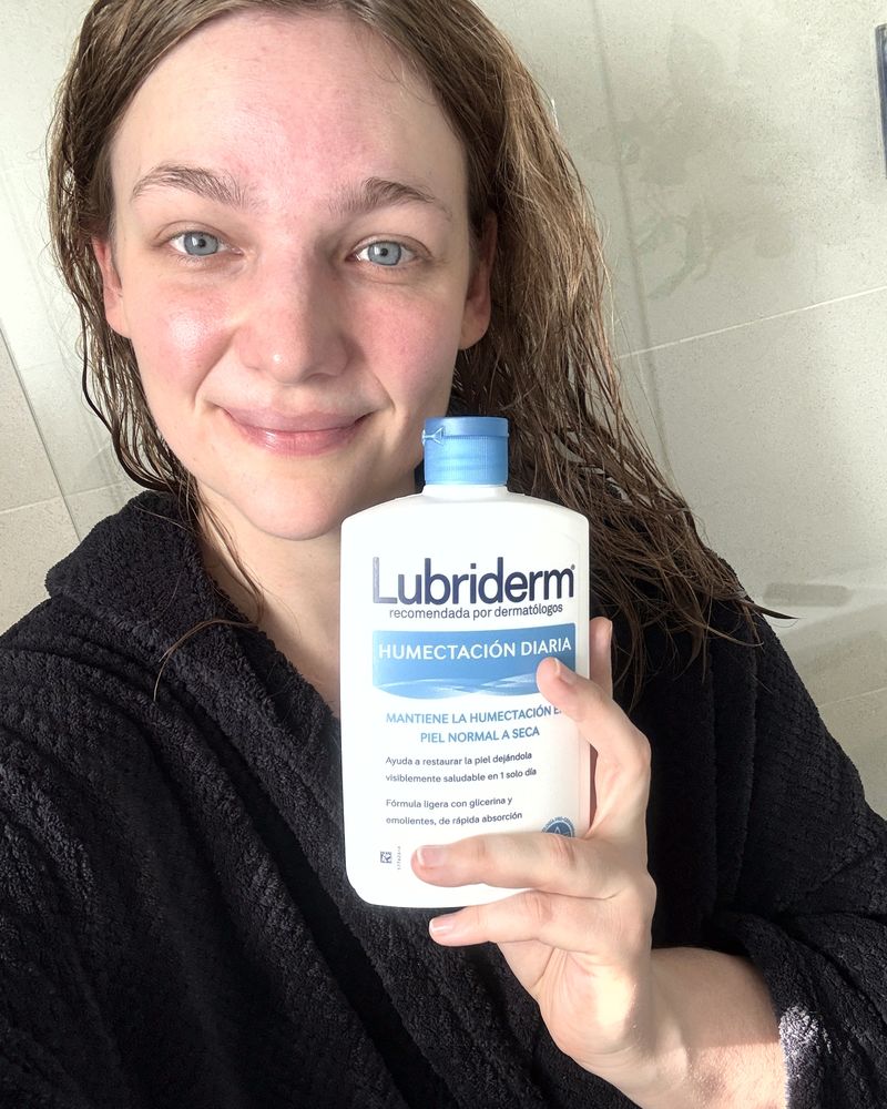 Me holding the Lubriderm bottle